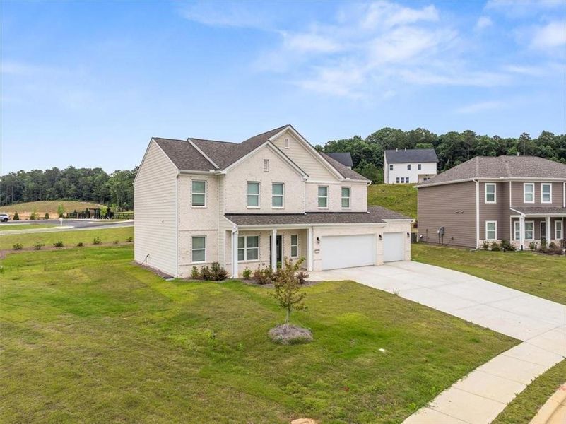 Front exterior of a new home in , Calhoun, GA, highlighting curb appeal (Image 23). Front exterior of a new home in , Calhoun, GA, highlighting curb appeal (Image 23).