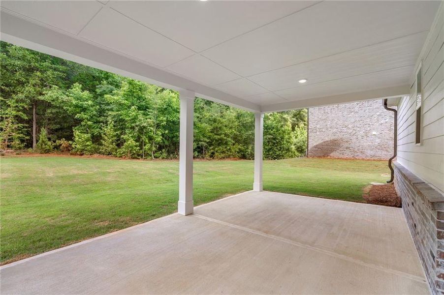 Exterior details and patio area of a home in Windsong Estates, McDonough (Image 20).