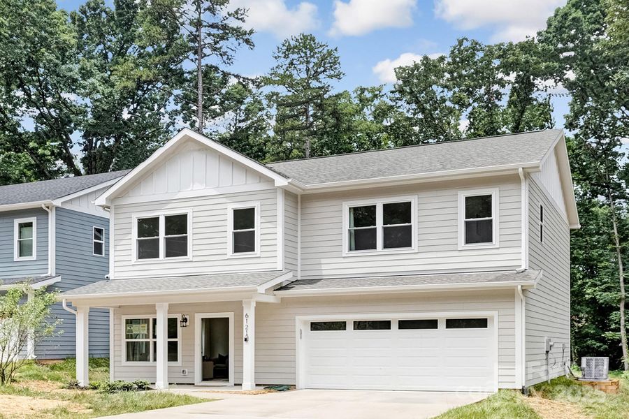 Front exterior of a new home in , Charlotte, NC, highlighting curb appeal (Image 19).