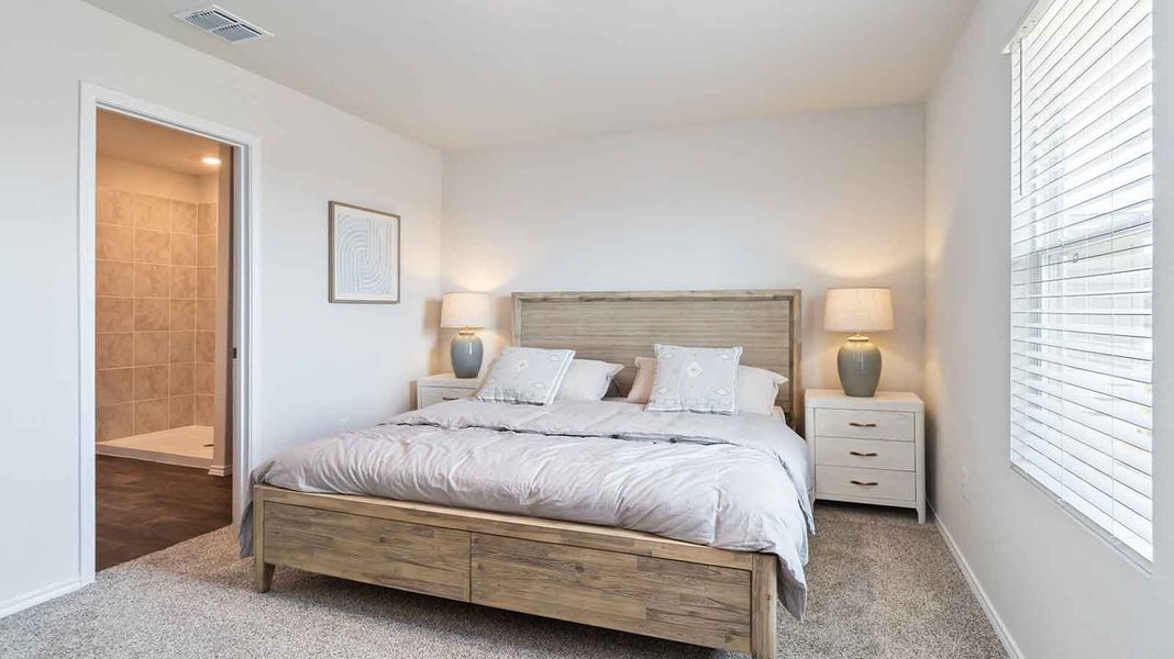 Representative furnished interior of a home built from the Barton by D.R. Horton in Watermark, Alvin (Image 12).