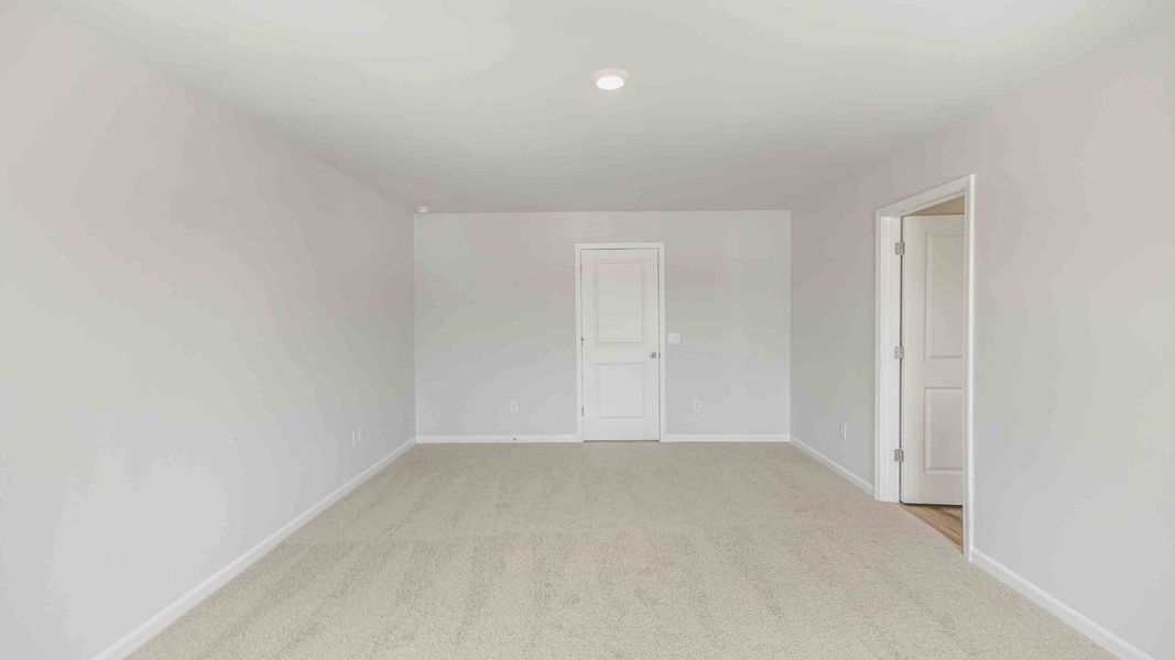 Spacious, unfurnished interior of a new home in Cedar Hill Landing, Navassa (Image 27). Spacious, unfurnished interior of a new home in Cedar Hill Landing, Navassa (Image 27).