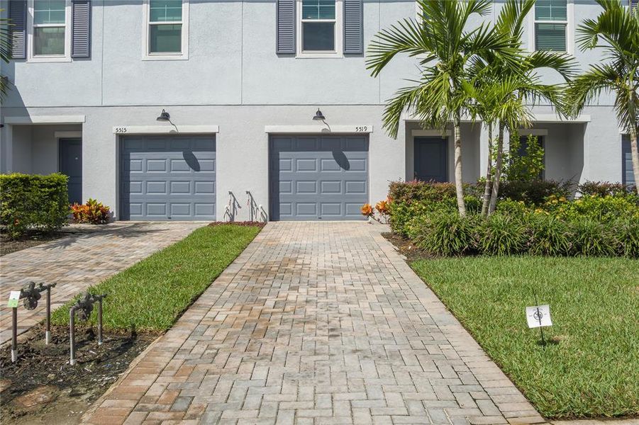 Front exterior of a new home in , Palmetto, FL, highlighting curb appeal (Image 25).