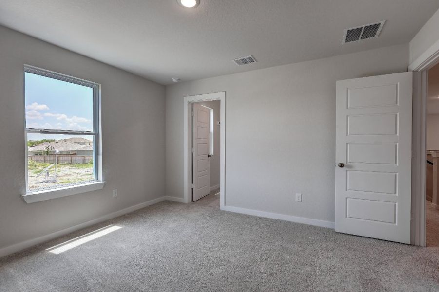 A room with white walls and a window. A room with white walls and a window.