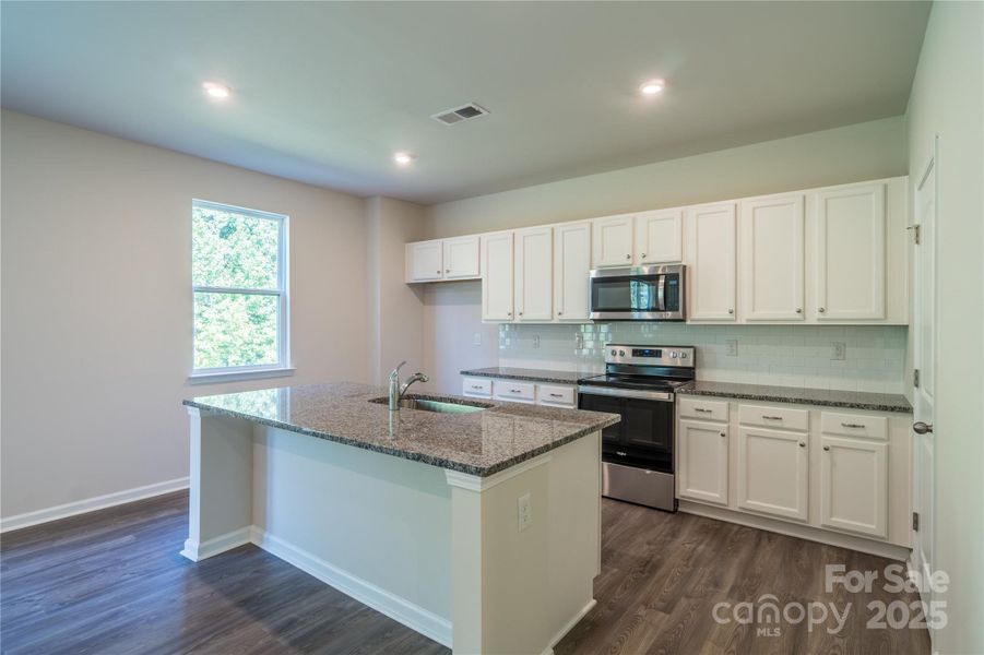 Furnished interior view inside a new home in , Charlotte (Image 5).