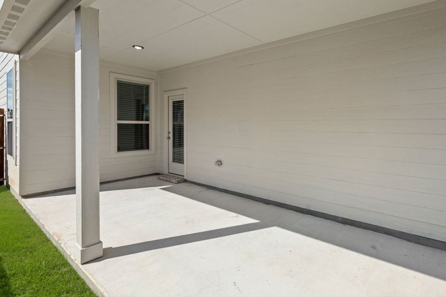 Front exterior of a new home in Creekside Ranch, Blue Ridge, TX, highlighting curb appeal (Image 18).