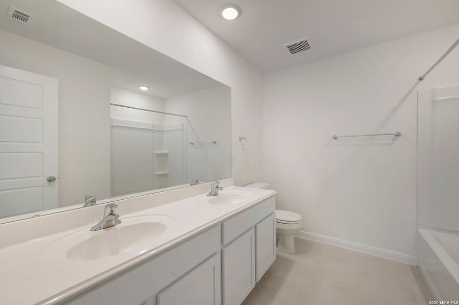 Furnished interior view inside a new home in Hickory Ridge Estates, Elmendorf (Image 9).