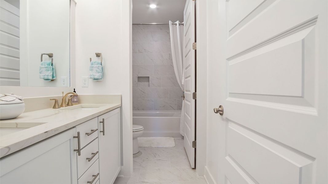 Representative furnished interior of a home built from the Brayden by D.R. Horton in Parkside, Santa Rosa Beach (Image 40).