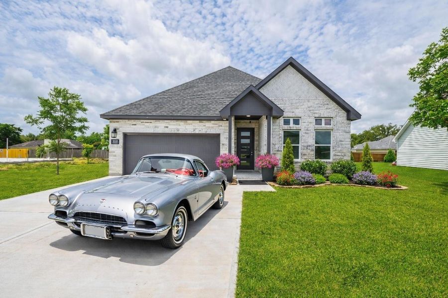 Front exterior of a new home in , Sweeny, TX, highlighting curb appeal (Image 2). Front exterior of a new home in , Sweeny, TX, highlighting curb appeal (Image 2).