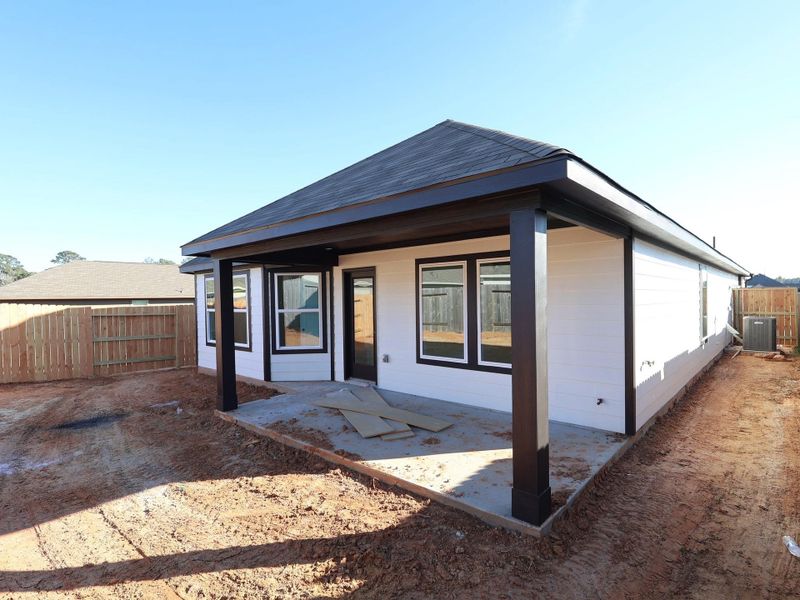 Exterior details and patio area of a home in Magnolia Ridge, Magnolia (Image 21). Exterior details and patio area of a home in Magnolia Ridge, Magnolia (Image 21).