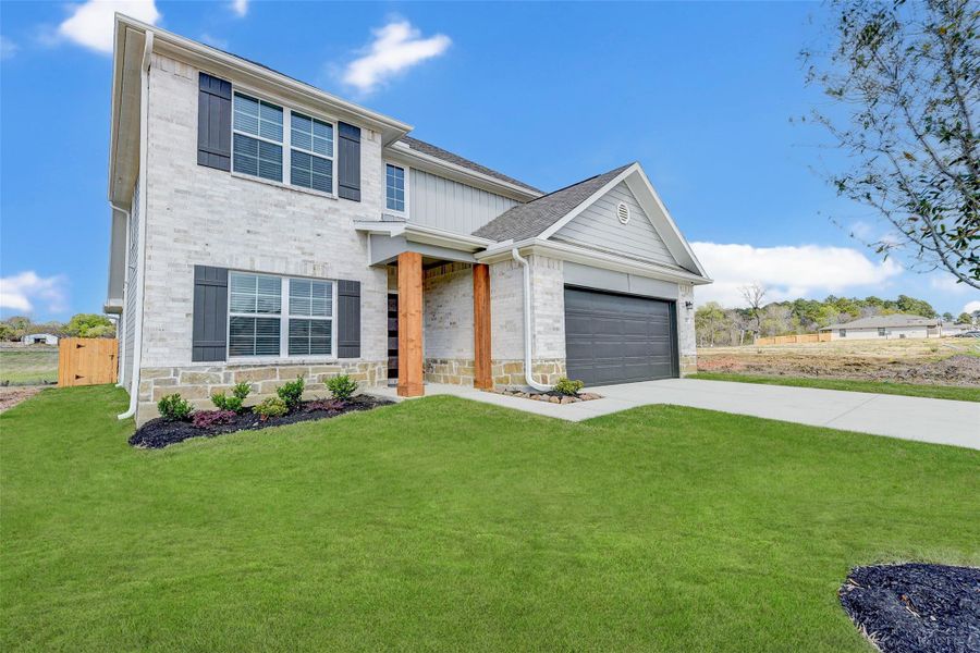 Front exterior of a new home in , Willis, TX, highlighting curb appeal (Image 2). Front exterior of a new home in , Willis, TX, highlighting curb appeal (Image 2).