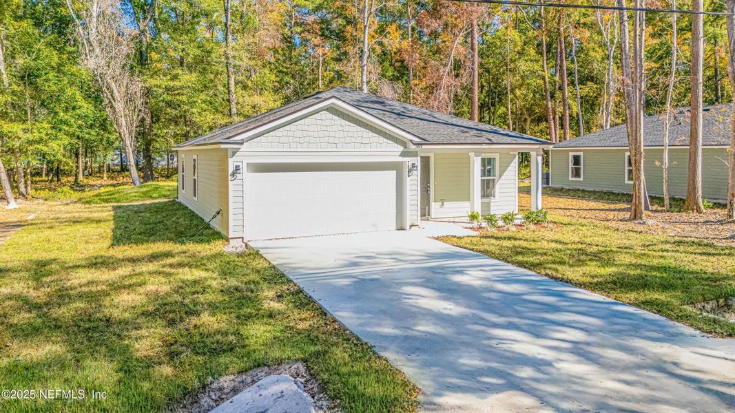 Front exterior of a new home in , Jacksonville, FL, highlighting curb appeal (Image 16). Front exterior of a new home in , Jacksonville, FL, highlighting curb appeal (Image 16).