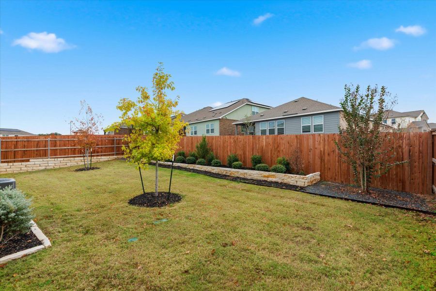 Exterior details and patio area of a home in Thunder Rock: Watermill Collection, Marble Falls (Image 26).