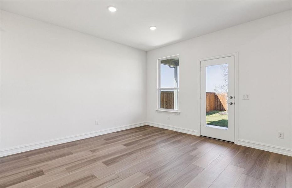 Spacious gathering room with access to backyard Spacious gathering room with access to backyard