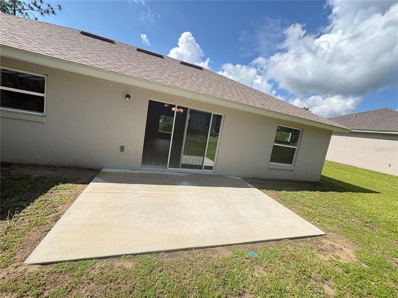Exterior details and patio area of a home in , Citrus Springs (Image 4).