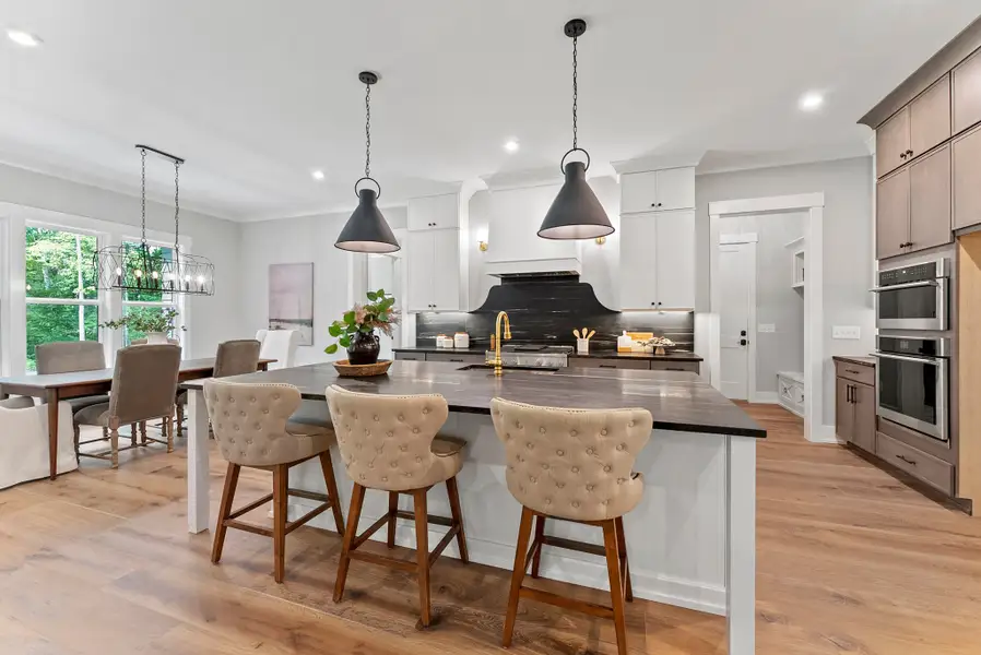 Representative furnished interior of a home built from the Nash by Homes by Dickerson in Cattail, Clayton (Image 7).