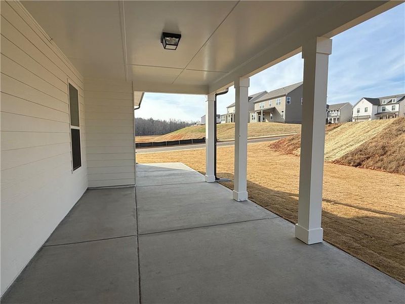 Exterior details and patio area of a home in Ponderosa Farms Reserve, Gainesville (Image 4). Exterior details and patio area of a home in Ponderosa Farms Reserve, Gainesville (Image 4).