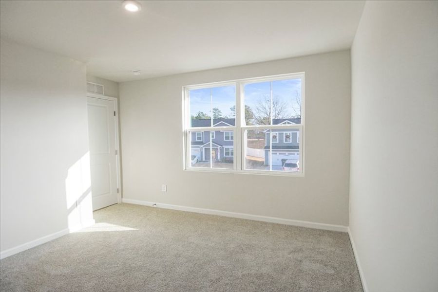 Spacious, unfurnished interior of a new home in Coopers Mill, Westminster (Image 32).