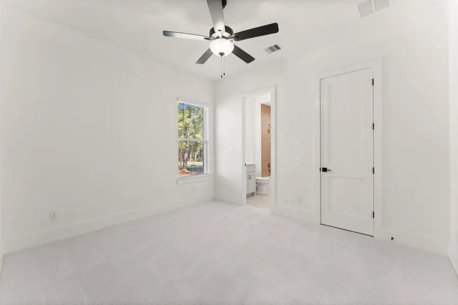 Spacious, unfurnished interior of a new home in Homestead Hill, New Waverly (Image 12).