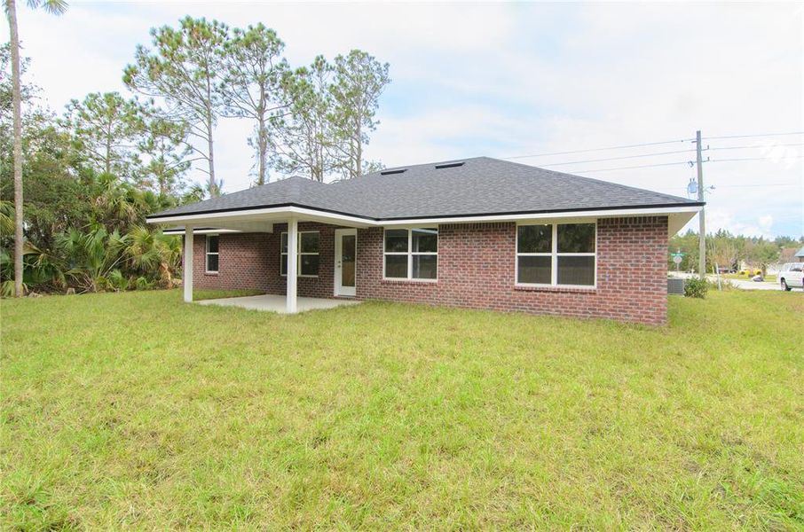 Exterior details and patio area of a home in , Palm Coast (Image 20). Exterior details and patio area of a home in , Palm Coast (Image 20).