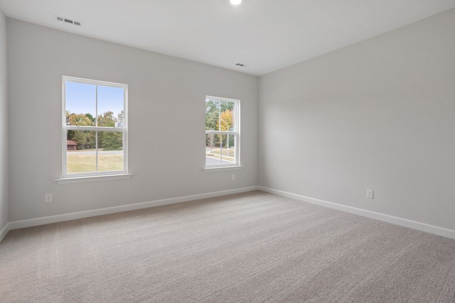 Spacious, unfurnished interior of a new home in Renaissance at White Oak, Garner (Image 21).
