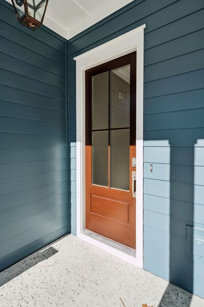 Exterior details and patio area of a home in , Awendaw (Image 40).
