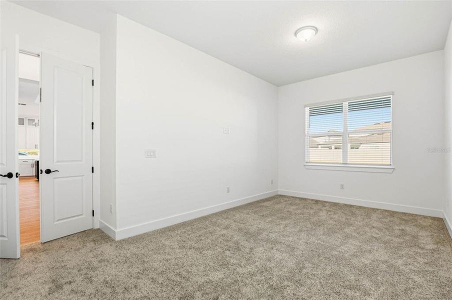 Spacious, unfurnished interior of a new home in Vida's Way, Wesley Chapel (Image 49).