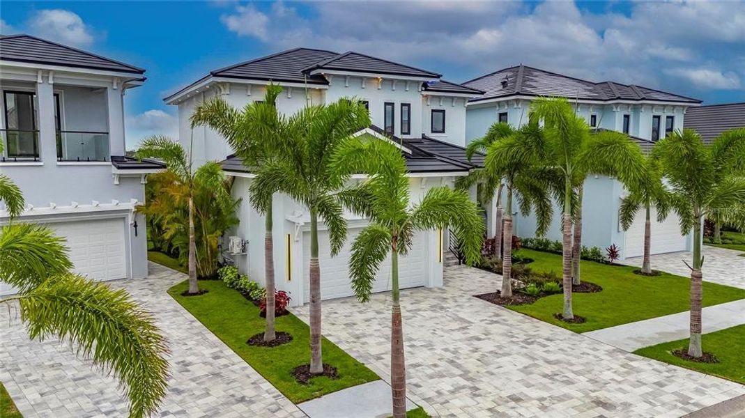 Front exterior of a new home in , Apollo Beach, FL, highlighting curb appeal (Image 36).