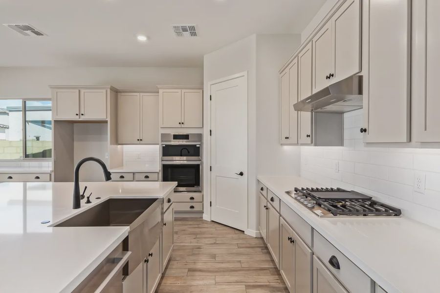Furnished interior view inside a new home in Valencia at Granite Vista, Waddell (Image 9).
