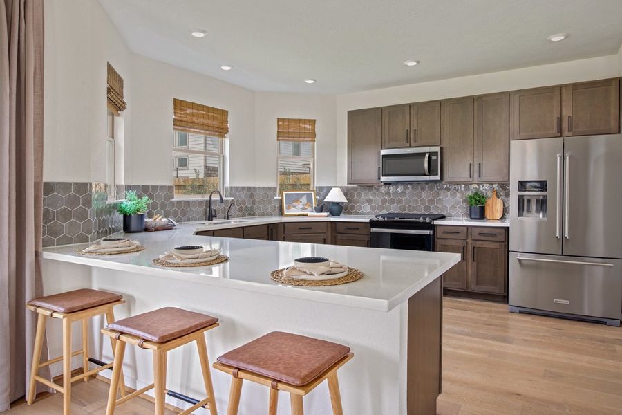 Representative furnished interior of a home built from the 2070 by KB Home in Sunset Grove South, Hitchcock (Image 6).