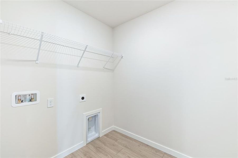 Spacious, unfurnished interior of a new home in Central Parc, North Port (Image 12).