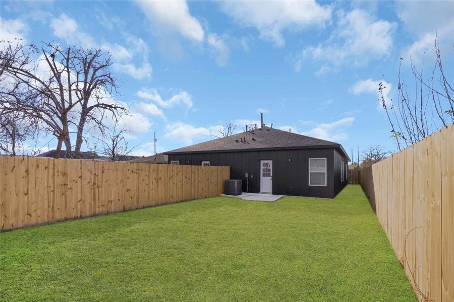 Exterior details and patio area of a home in , Houston (Image 3).