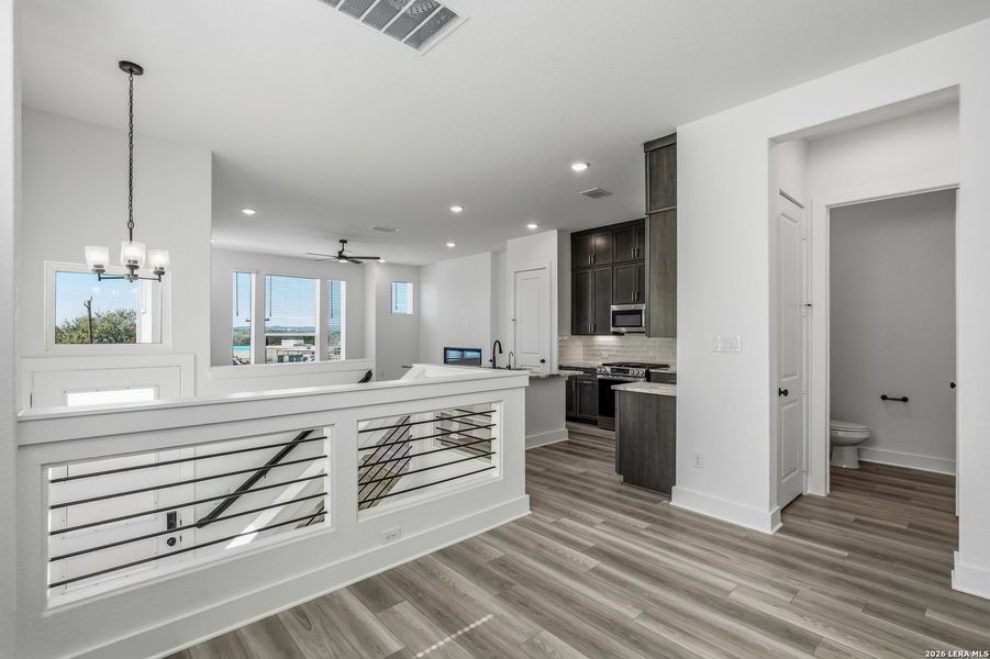 Furnished interior view inside a new home in Rose Hill, San Antonio (Image 15).