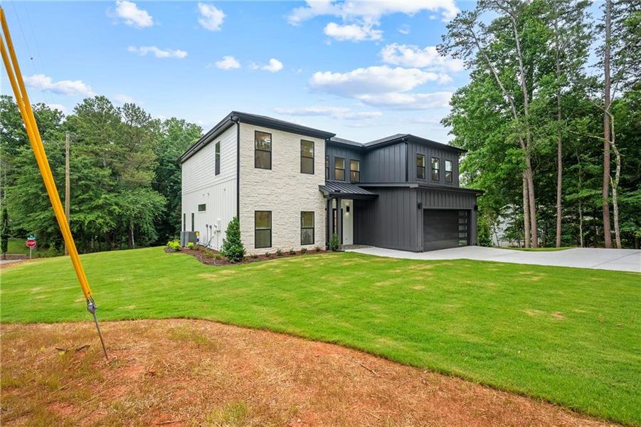 Front exterior of a new home in , Gainesville, GA, highlighting curb appeal (Image 28). Front exterior of a new home in , Gainesville, GA, highlighting curb appeal (Image 28).