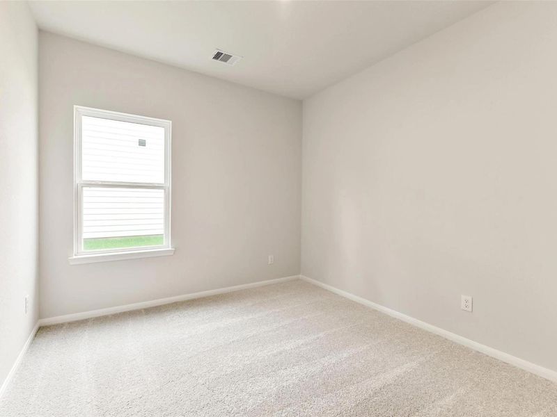 Spacious, unfurnished interior of a new home in Caney Creek Place, Conroe (Image 24).