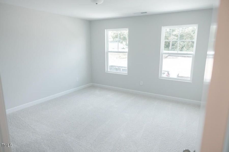 Spacious, unfurnished interior of a new home in Gregory Village, Lillington (Image 96).