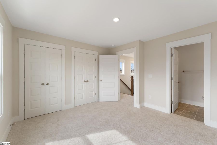 Spacious, unfurnished interior of a new home in Renaissance Place, Greenville (Image 17).