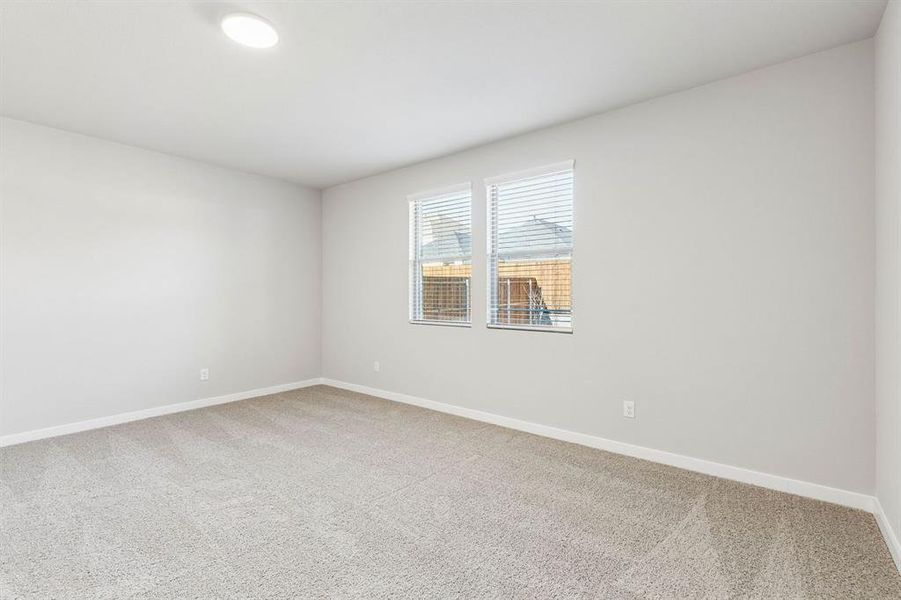 Bedroom in the Haylee home plan by Trophy Signature Homes - REPRESENTATIVE PHOTO Bedroom in the Haylee home plan by Trophy Signature Homes - REPRESENTATIVE PHOTO