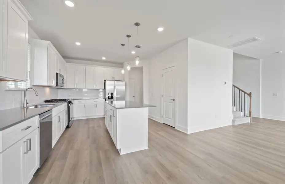 Furnished interior view inside a new home in Crosswinds, Kyle (Image 7).