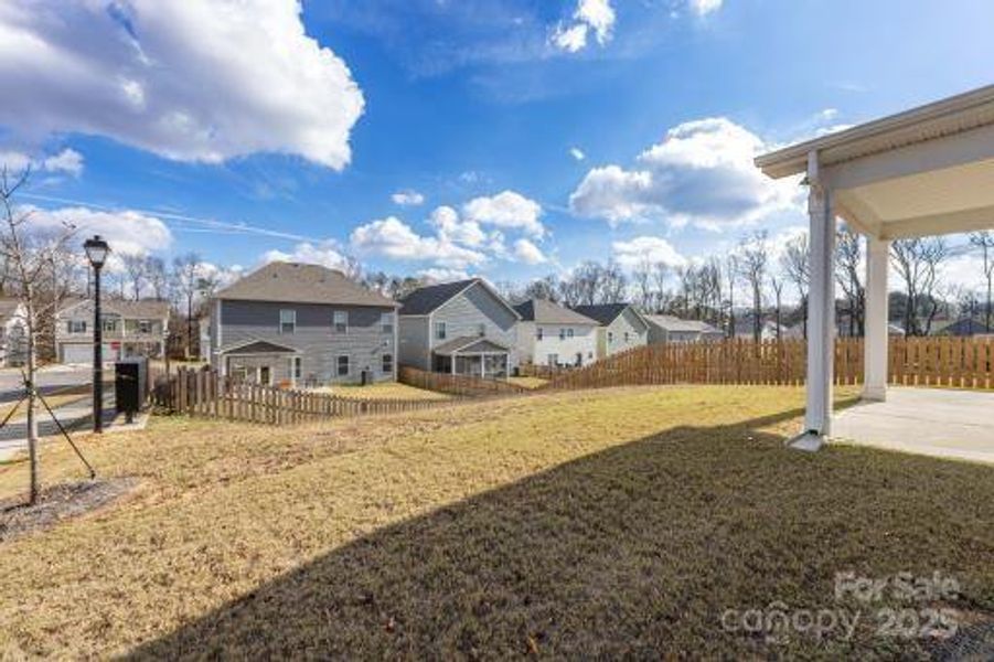 Exterior details and patio area of a home in Wilora Pond, Charlotte (Image 2). Exterior details and patio area of a home in Wilora Pond, Charlotte (Image 2).