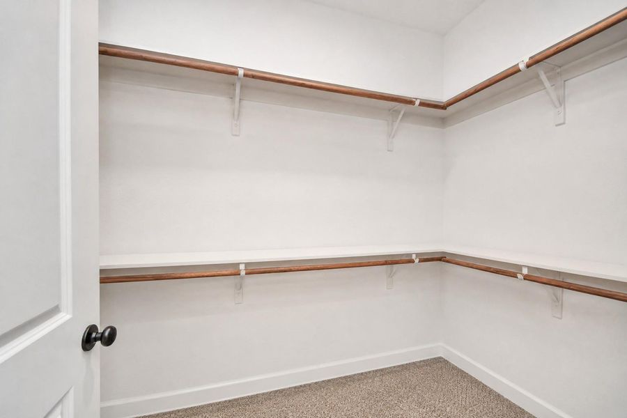 Spacious, unfurnished interior of a new home in The Groves 35', Humble (Image 25). Spacious, unfurnished interior of a new home in The Groves 35', Humble (Image 25).