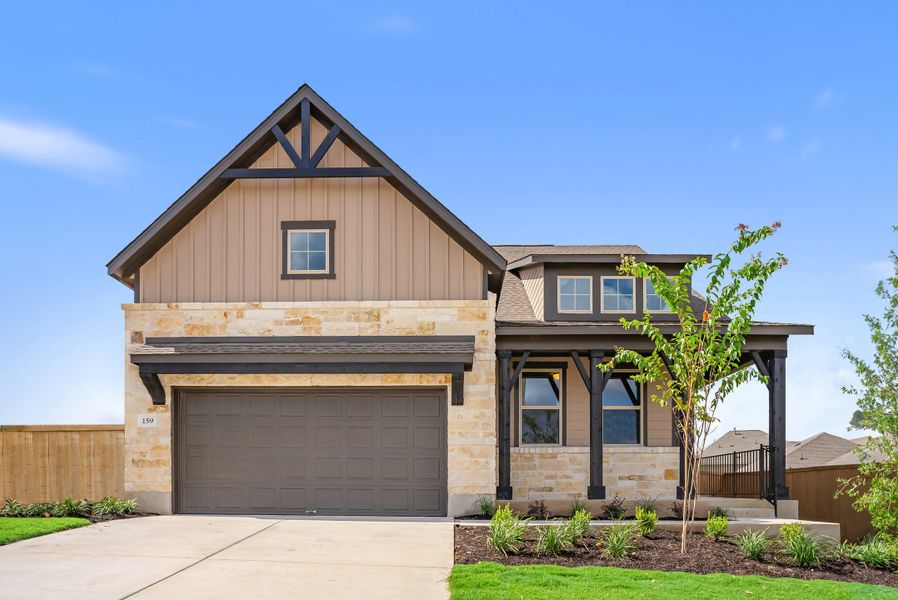 Representative exterior photo of a completed home built from the Texoma by Ashton Woods in The Colony 50s, Bastrop, TX (Image 1).