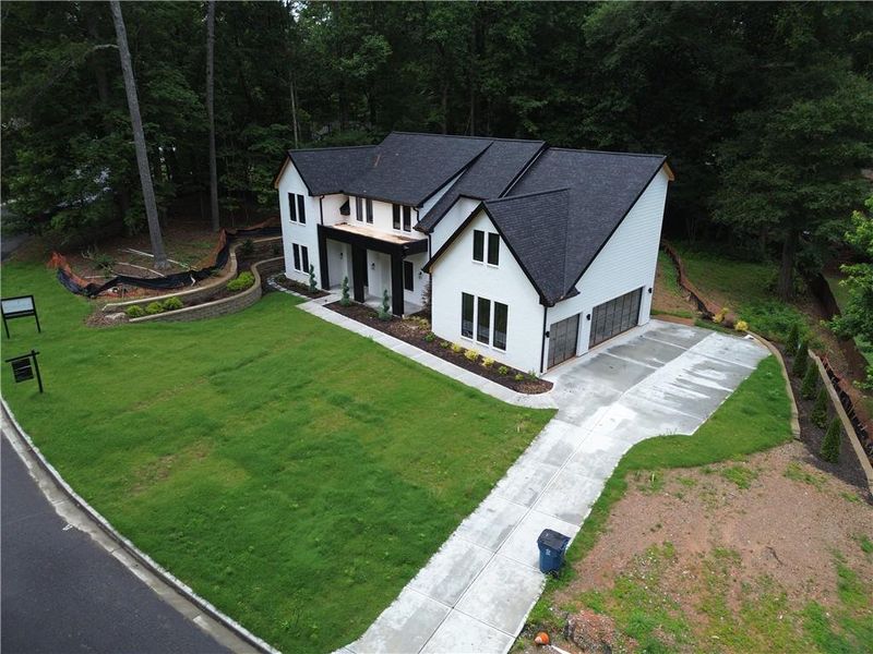 Front exterior of a new home in , Alpharetta, GA, highlighting curb appeal (Image 31).