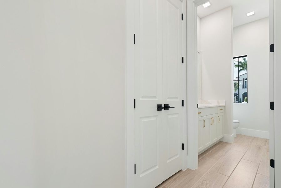 Representative unfurnished interior of a home built from the Madrona 58 by GHO Homes in Tesoro Club, Port St. Lucie (Image 36).