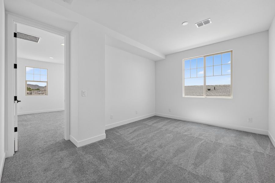 Spacious, unfurnished interior of a new home in Ellsworth Ranch, Queen Creek (Image 22). Spacious, unfurnished interior of a new home in Ellsworth Ranch, Queen Creek (Image 22).