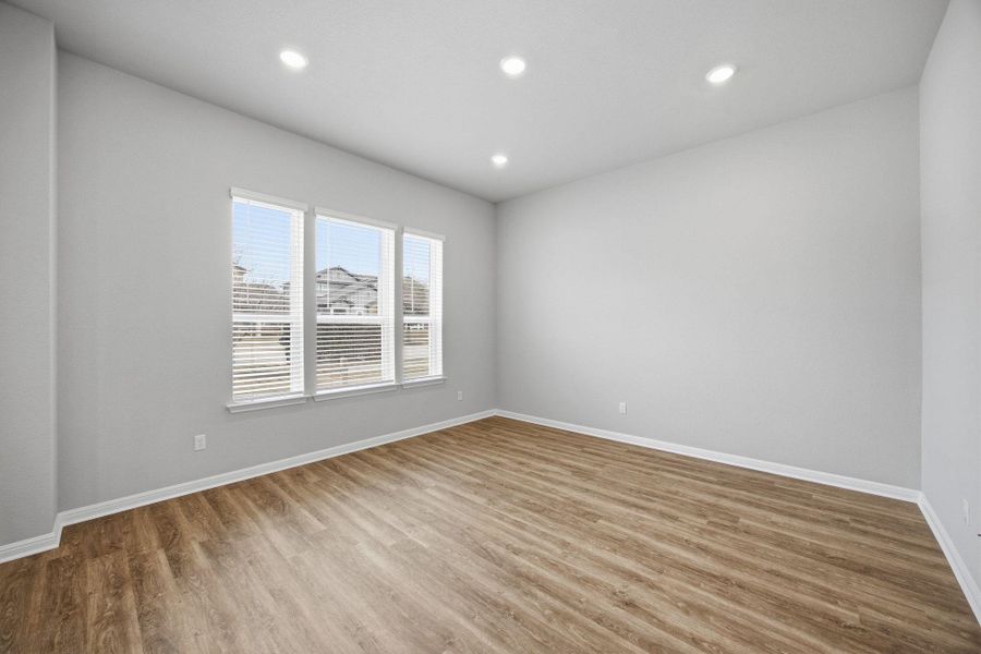 Spare room featuring recessed lighting and light wood-style floors