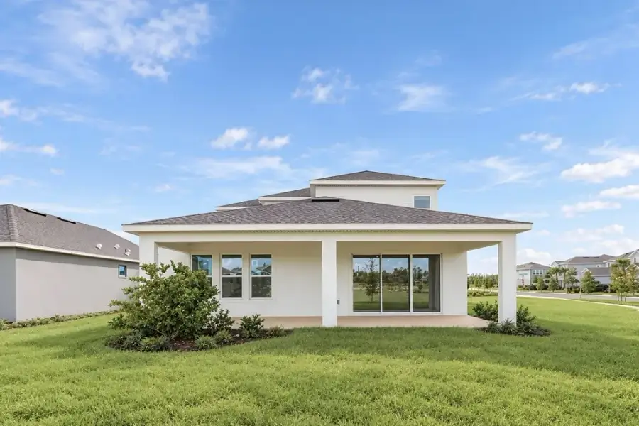 Exterior details and patio area of a home in Center Lake Ranch Community Group Page, St. Cloud (Image 3).