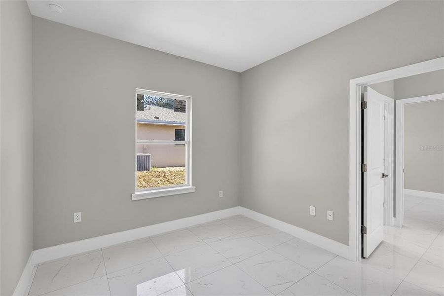 Spacious, unfurnished interior of a new home in , Port Charlotte (Image 35).