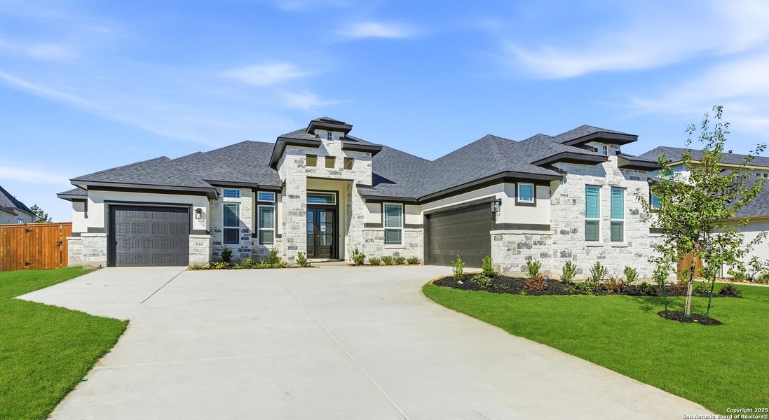 Front exterior of a new home in Mesa Western, Cibolo, TX, highlighting curb appeal (Image 24).