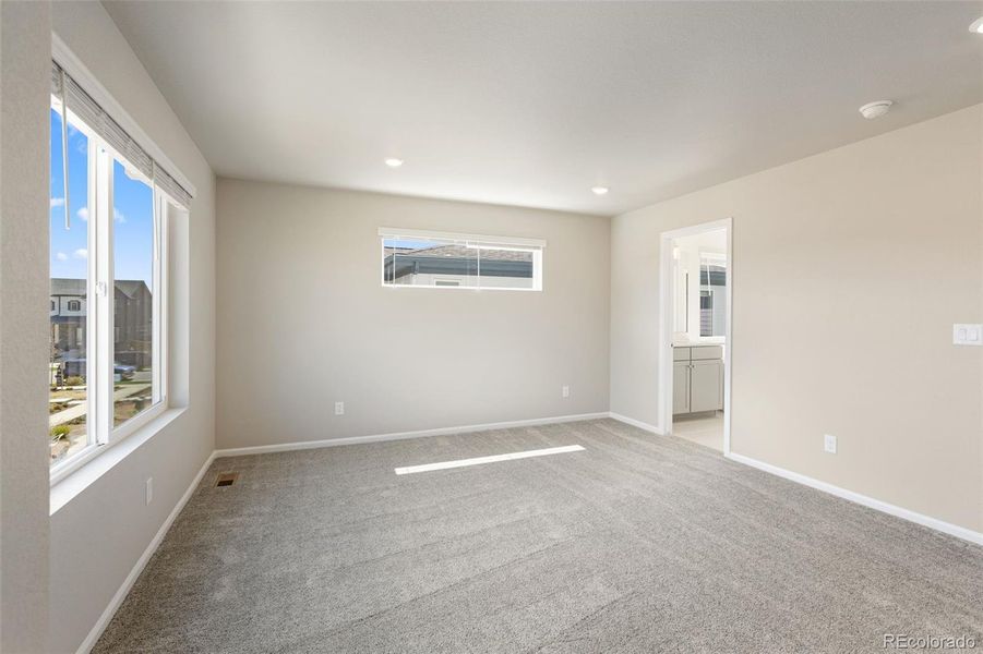 Spacious, unfurnished interior of a new home in Woodrose at Painted Prairie, Aurora (Image 27).