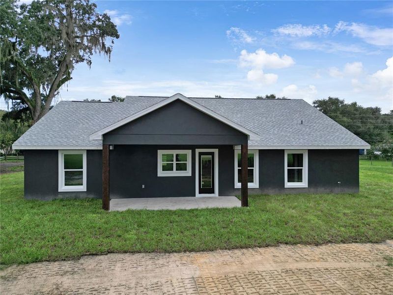Exterior details and patio area of a home in , Bushnell (Image 4).